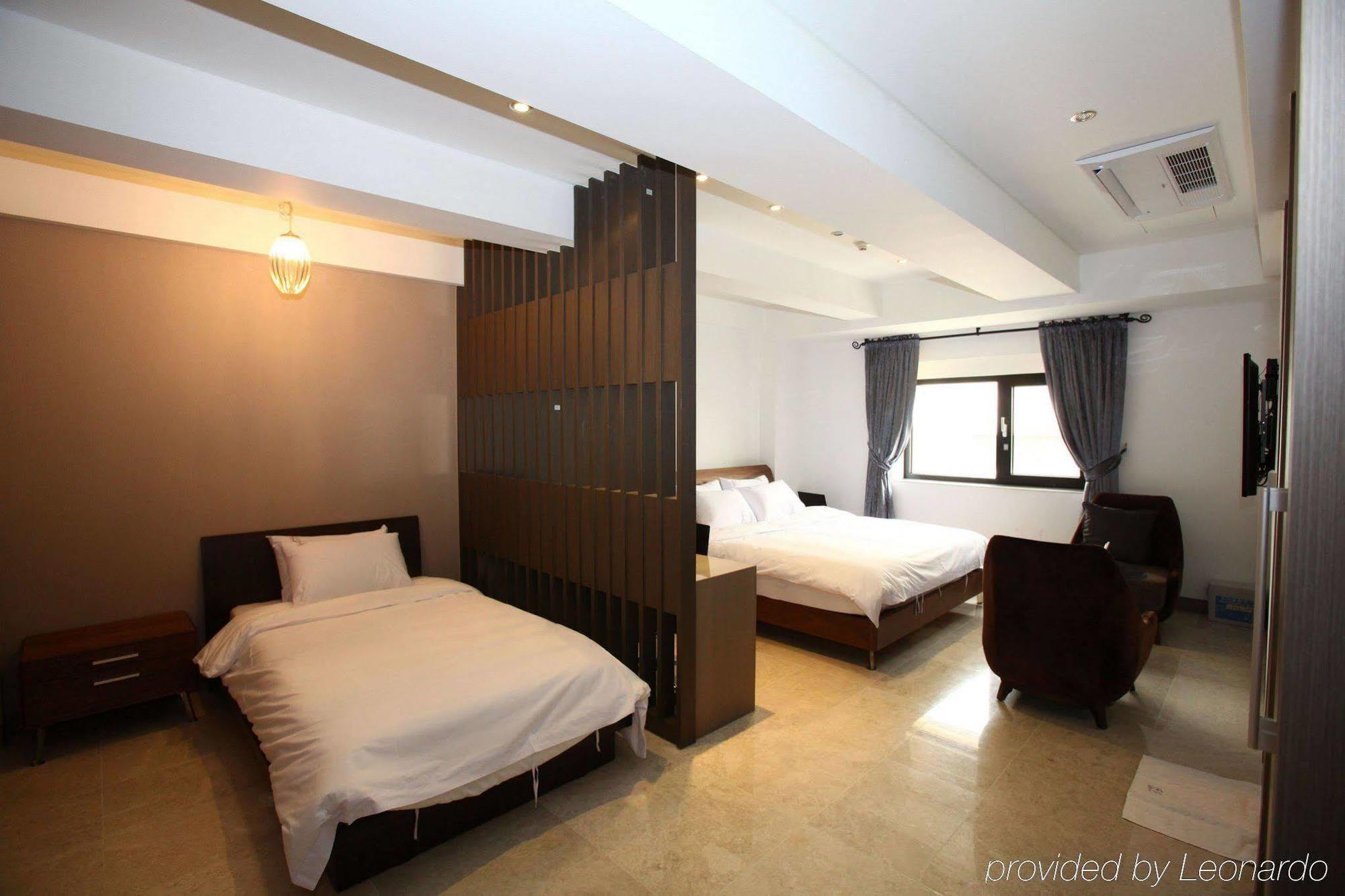 Suwon Reve Hotel Værelse billede